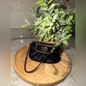 Coach Black and Gold Wristlet